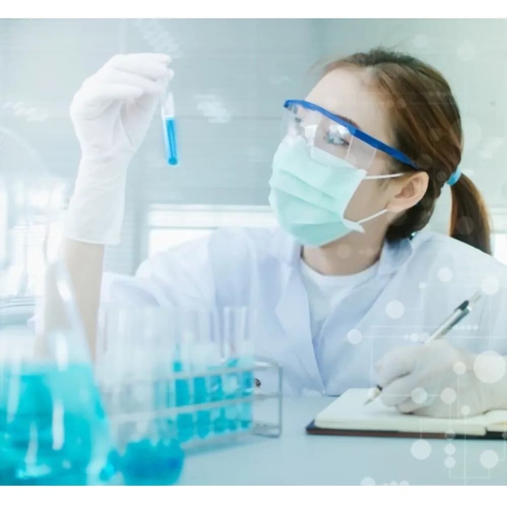 Scientist examining a test tube in the lab