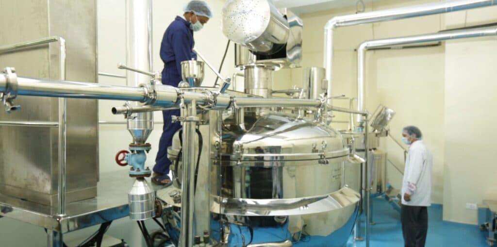 Automated stainless steel processing equipment in the manufacturing plant